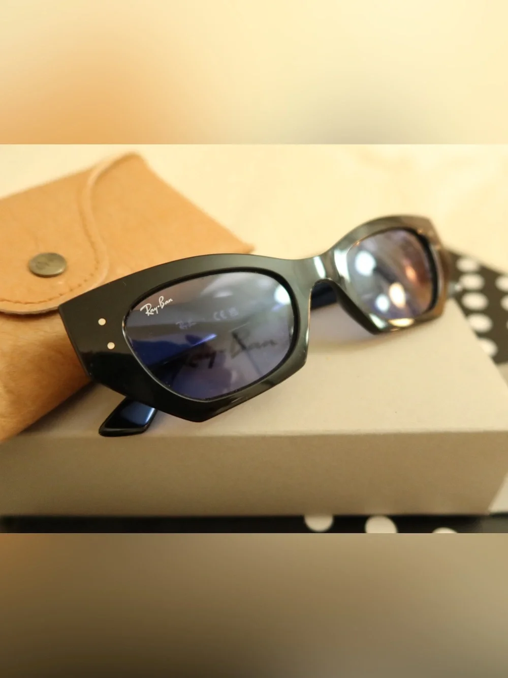 Ray-Ban Women's Black Frame Sunglasses with Light Blue Lenses